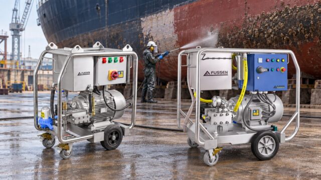 Fussen high pressure washers at a dry dock while an operator cleans a fouled ship hull